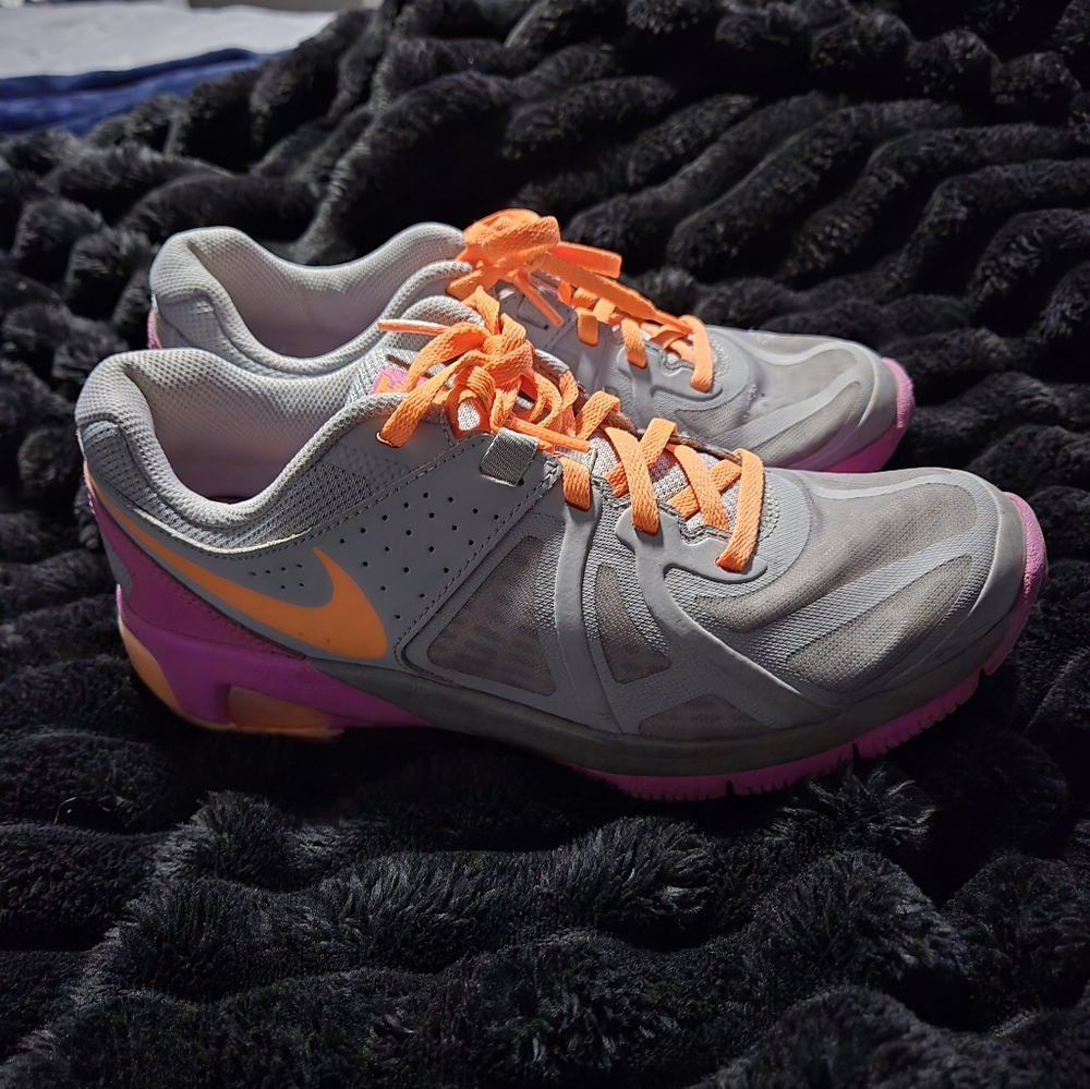 Nike Women's Gray Athletic Shoes with Pink and Orange Accents